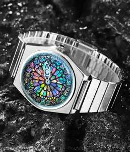 Detailed macro view of quartz watch with vibrant stained glass eye dial and silver steel strap
