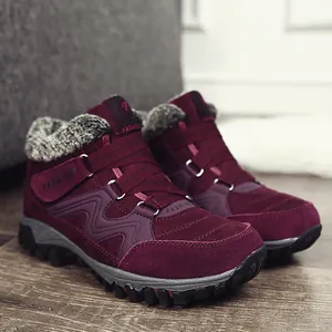 Stylish burgundy winter boots featuring thick fleece lining and durable non-slip rubber soles