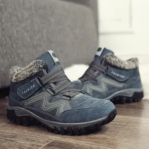 Durable men's blue winter boots featuring thick fur lining and anti-slip outdoor rubber sole