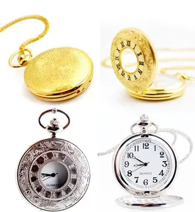 Detailed view of vintage hollow pocket watches in gold and silver finishes
