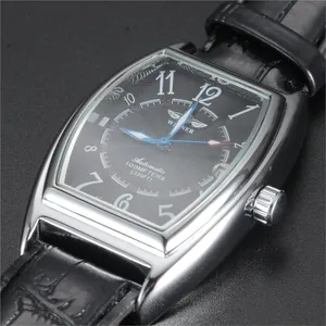 Macro view of WINNER men's mechanical watch with tonneau shaped case and black dial