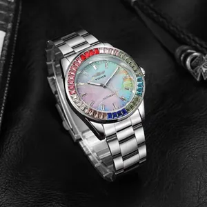 Detail view of Winner automatic mechanical watch with rainbow bezel and iridescent dial