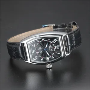 Detailed macro view of WINNER men's tonneau-shaped automatic mechanical watch dial