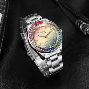 Close-up of Winner men's automatic watch with rainbow gem bezel and gradient dial
