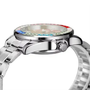 Macro detail of rainbow colored crystal bezel on silver automatic mechanical watch