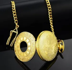 Close-up of gold vintage pocket watch with hollow Roman numeral cover and chain