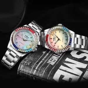 Winner automatic mechanical watch with rainbow crystal bezel and gradient dial detail
