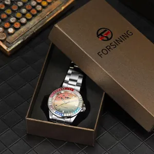 Detail of Winner automatic watch with rainbow crystal bezel inside Forsining display box