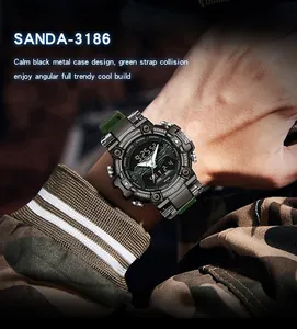 Close-up of Sanda 3186 dual-display digital watch on wrist with camouflage outfit