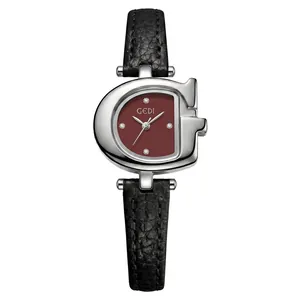 Reloj vintage de mujer en forma de G con esfera color burdeos y correa de cuero negro