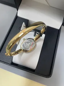 Reloj de brazalete ovalado Sunlifex dorado mujer, vista trasera de acero