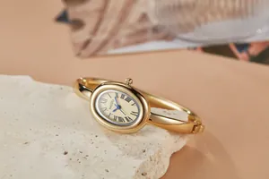 Vintage stijl goudkleurig ovaal armbandhorloge voor dames met blauwe wijzers en Romeinse cijfers