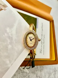 Elegante reloj de brazalete ovalado dorado SUNLIFEX para mujer con bisel de cristales