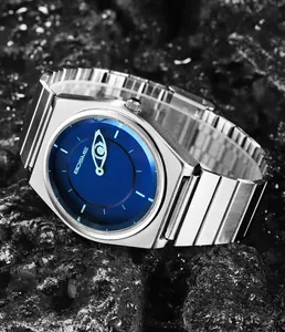 Macro detail of BOSME quartz watch featuring blue dial and silver steel band