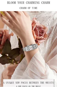 Gros plan d'une élégante montre argentée pour femme à double cadran rectangulaire