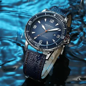 Close-up van AOCASDIY blauw kwartshorloge met lederen band en dynamisch waterspateffect