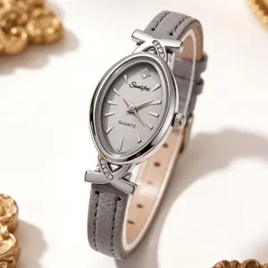 Detailed macro shot of an elegant women's oval quartz watch with silver rhinestone accents
