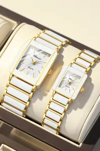 Detailed view of Chenxi square gold and white ceramic couple watches in a gift box