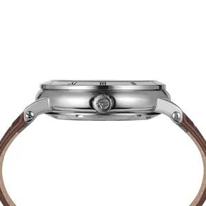 Side profile view of a silver mechanical watch with engraved Roman numeral bezel.