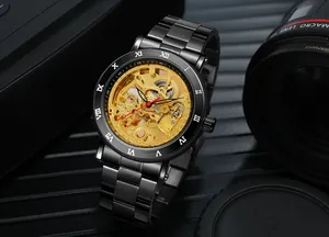 Macro detail of Forsining men's mechanical watch with golden skeleton dial