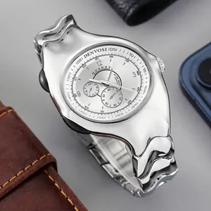 Irregular distorted silver Y2K vintage watch with white multi-dial face on gray background.