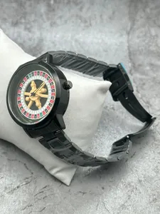 Detailed shot of men's watch with a functional spinning roulette dial design