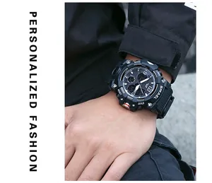 Detailed close-up view of SMAEL 8008 rugged black digital sports watch worn on a wrist.