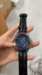 Aokulasic men's mechanical watch with rainbow crystal bezel and blue starry sky dial detail