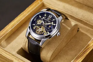 Close-up of AOKULASIC automatic mechanical watch with skeleton dial and leather strap.