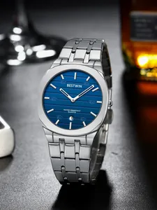 Close-up detail of BESTWIN men's luxury quartz watch featuring a blue textured dial