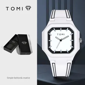 Élégante montre carrée TOMI en silicone blanc avec un cadran noir et blanc minimaliste