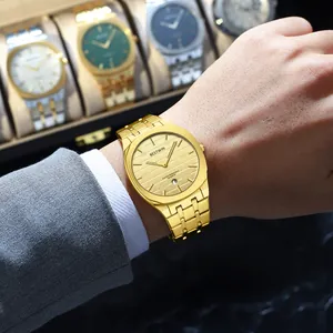 Close-up of BESTWIN ultra-thin gold quartz watch with steel strap on male wrist