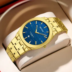 Detail of gold-tone men's quartz watch with striped blue dial and steel strap.