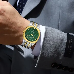 Close-up of Bestwin luxury men's quartz watch with green dial and bicolour strap