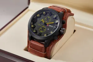 Detail of oversized men's sports watch with black dial and brown leather cuff strap