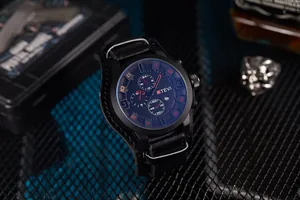 Detailed close-up of tactical men's watch with oversized black dial and leather strap