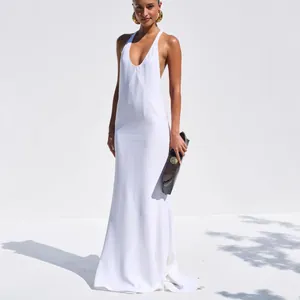 Elegant white long summer maxi dress with sexy deep V-neck and suspender straps.