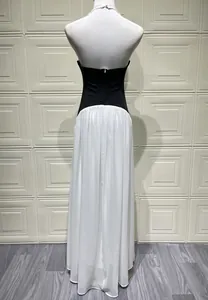 Detailed back view of a French style black and white backless evening maxi dress