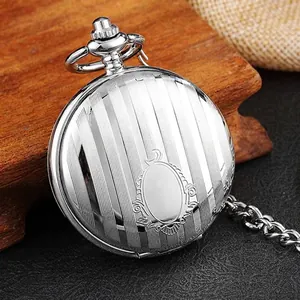 Vintage silver mechanical pocket watch with elegant vertical stripes on cover.