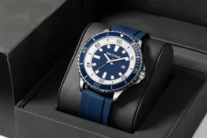 Macro view of AOCASDIY men's watch with blue dial and silicone strap in a gift box
