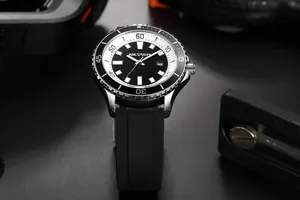 Macro detail of AOCASDIY men's watch featuring a black dial and silicone strap
