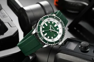 Close-up of AOCASDIY men's watch with green silicone strap and matching green dial