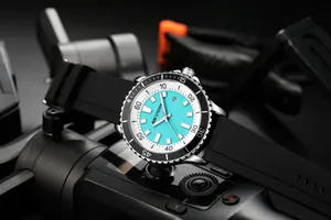 Detailed view of AOCASDIY men's watch with turquoise dial and black silicone strap