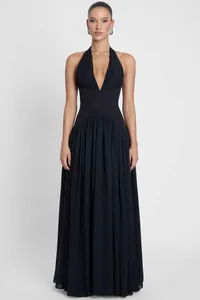 Elegant black halter neck deep V-neck evening maxi dress featuring a flowing pleated skirt
