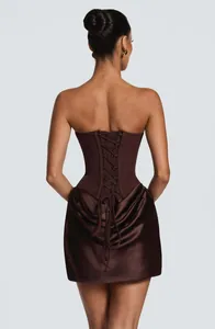 Close-up detail of dark brown corset mini dress featuring a sexy lace-up back design