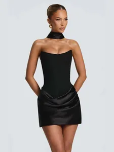 Elegant black strapless corset mini dress with a draped satin skirt and matching choker necklace.