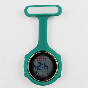 Close-up of green silicone digital nurse fob watch with pin-on clip for medical professionals
