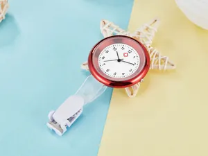 Professional red quartz nurse lapel watch with clip-on strap and medical cross dial design