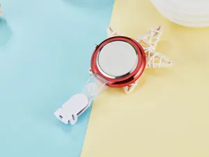 Detail view of the red metallic retractable quartz nurse fob watch back with clip