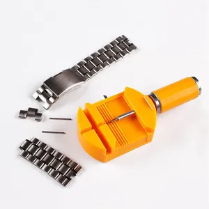 Detailansicht des gelben Gliederentferners mit Uhrenarmband-Segmenten aus Metall